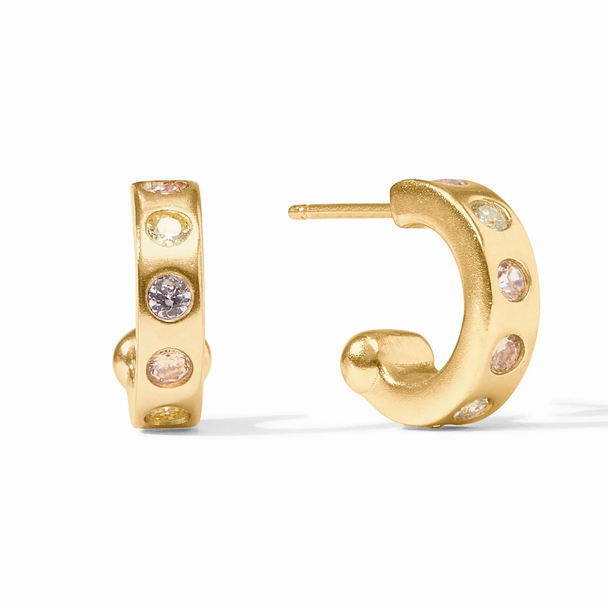 Gold hoop earrings with embedded gemstones on a white background