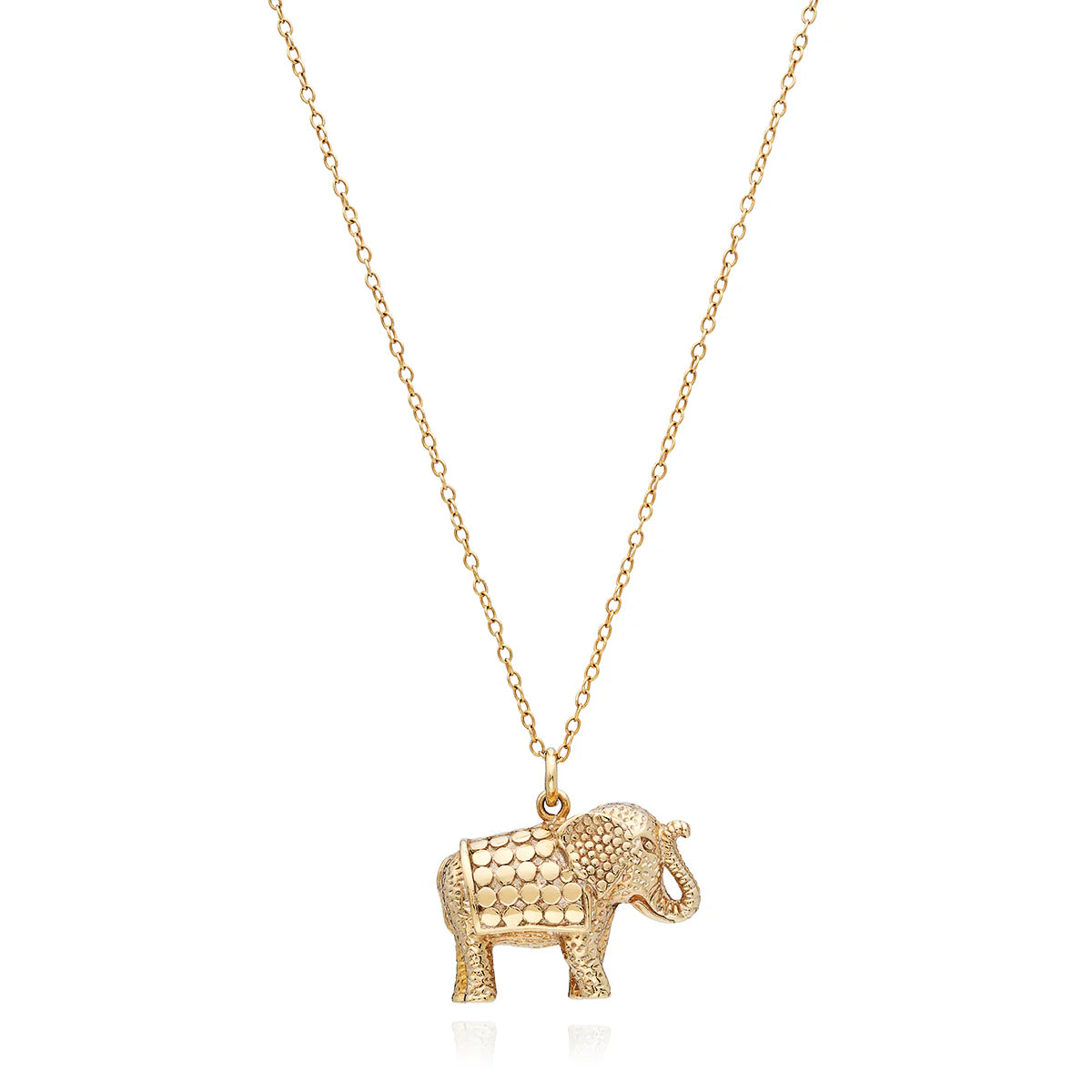 Gold elephant pendant necklace on a white background