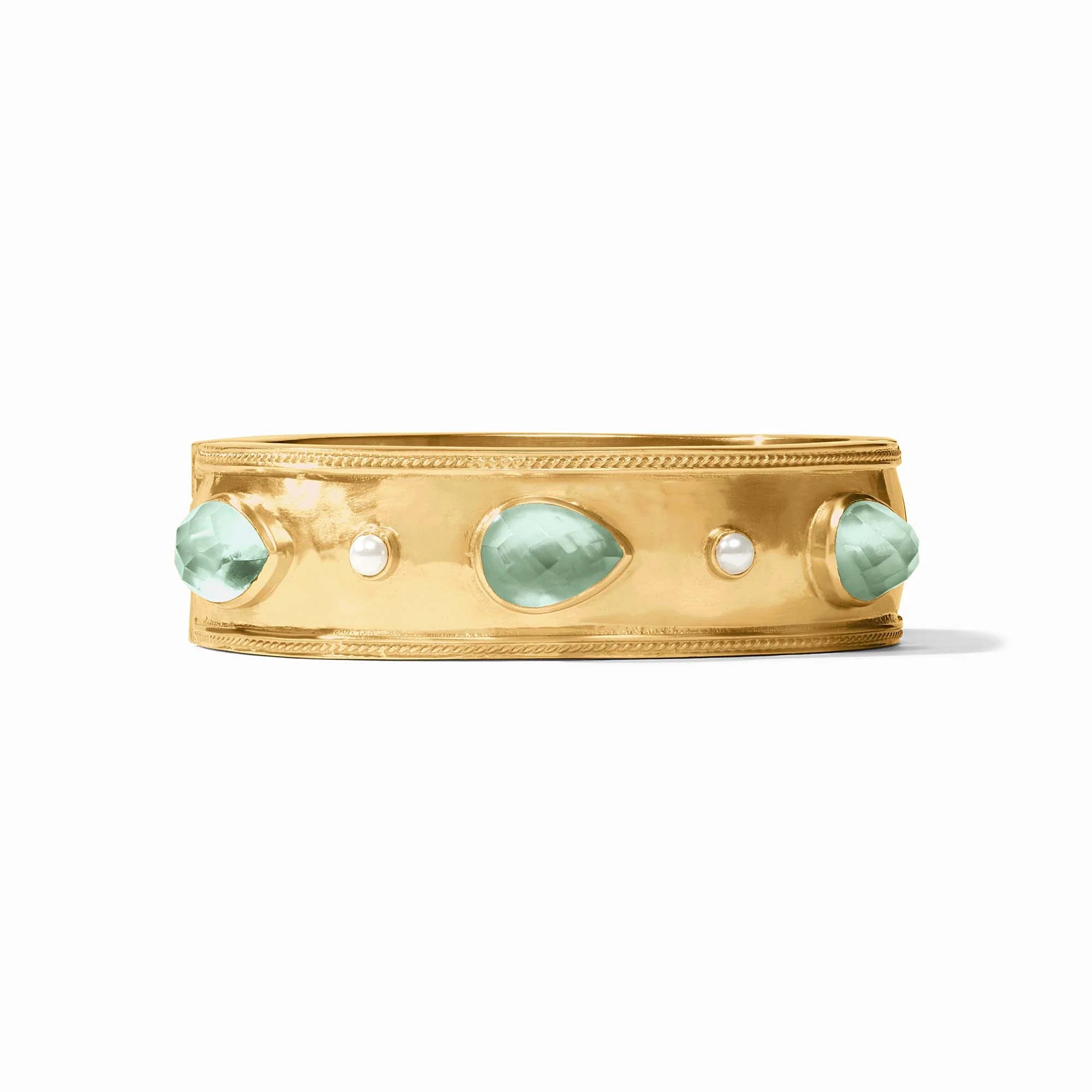 Gold bracelet with green gemstones on a white background