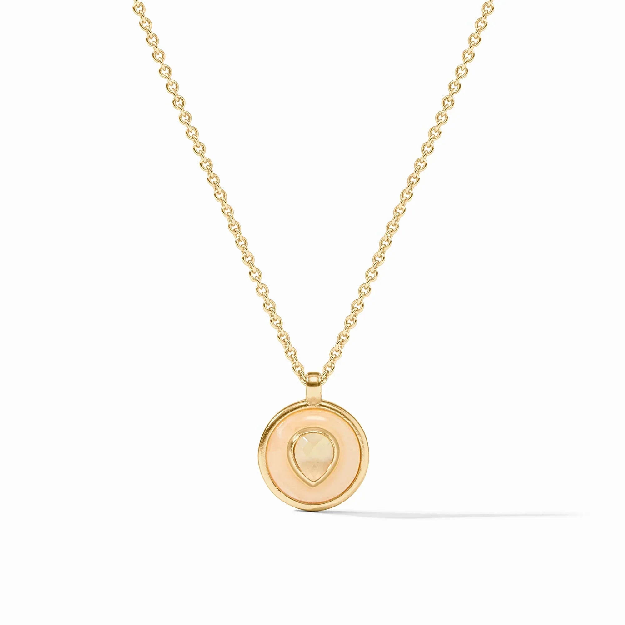 Gold necklace with a pendant on a white background