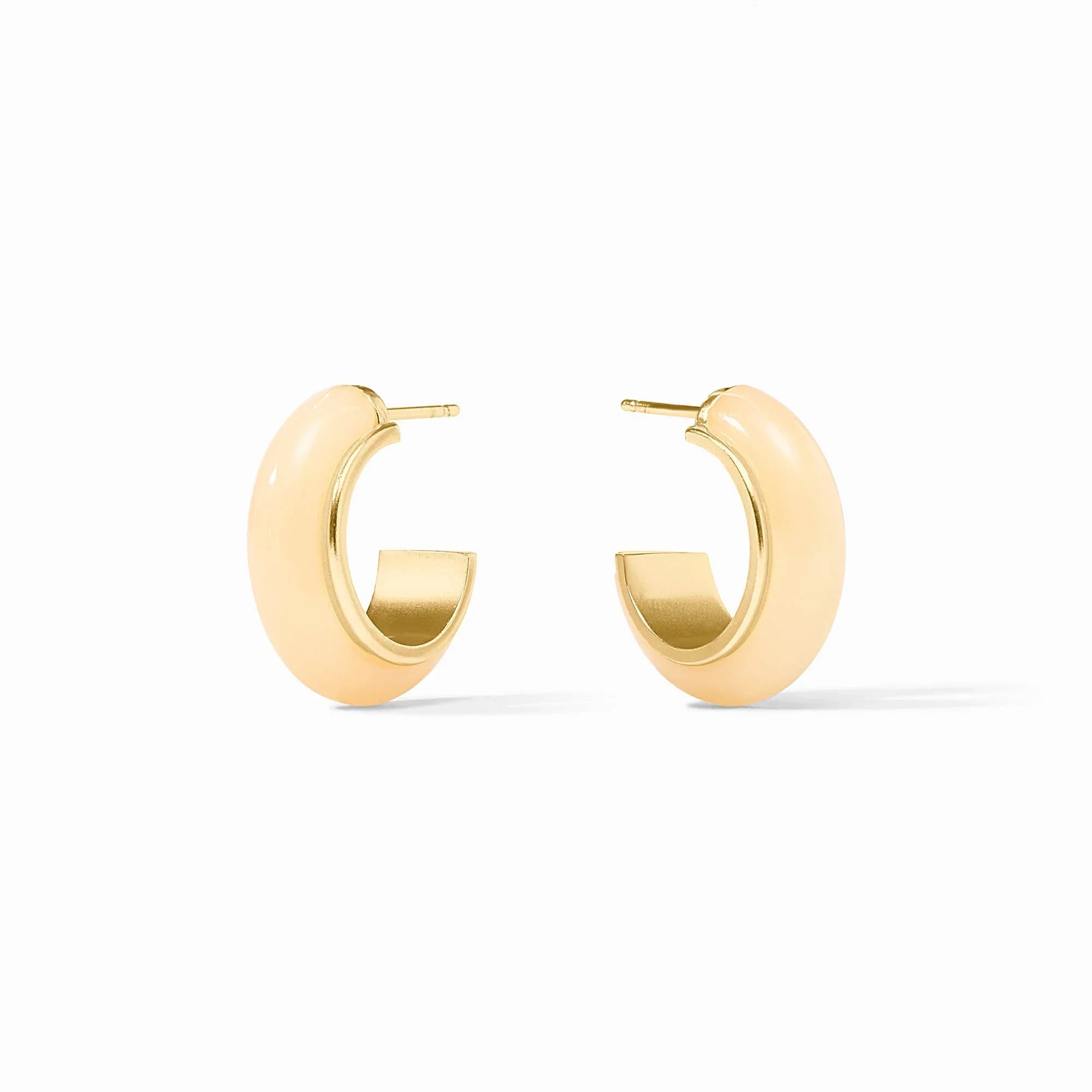 Gold hoop earrings on a white background