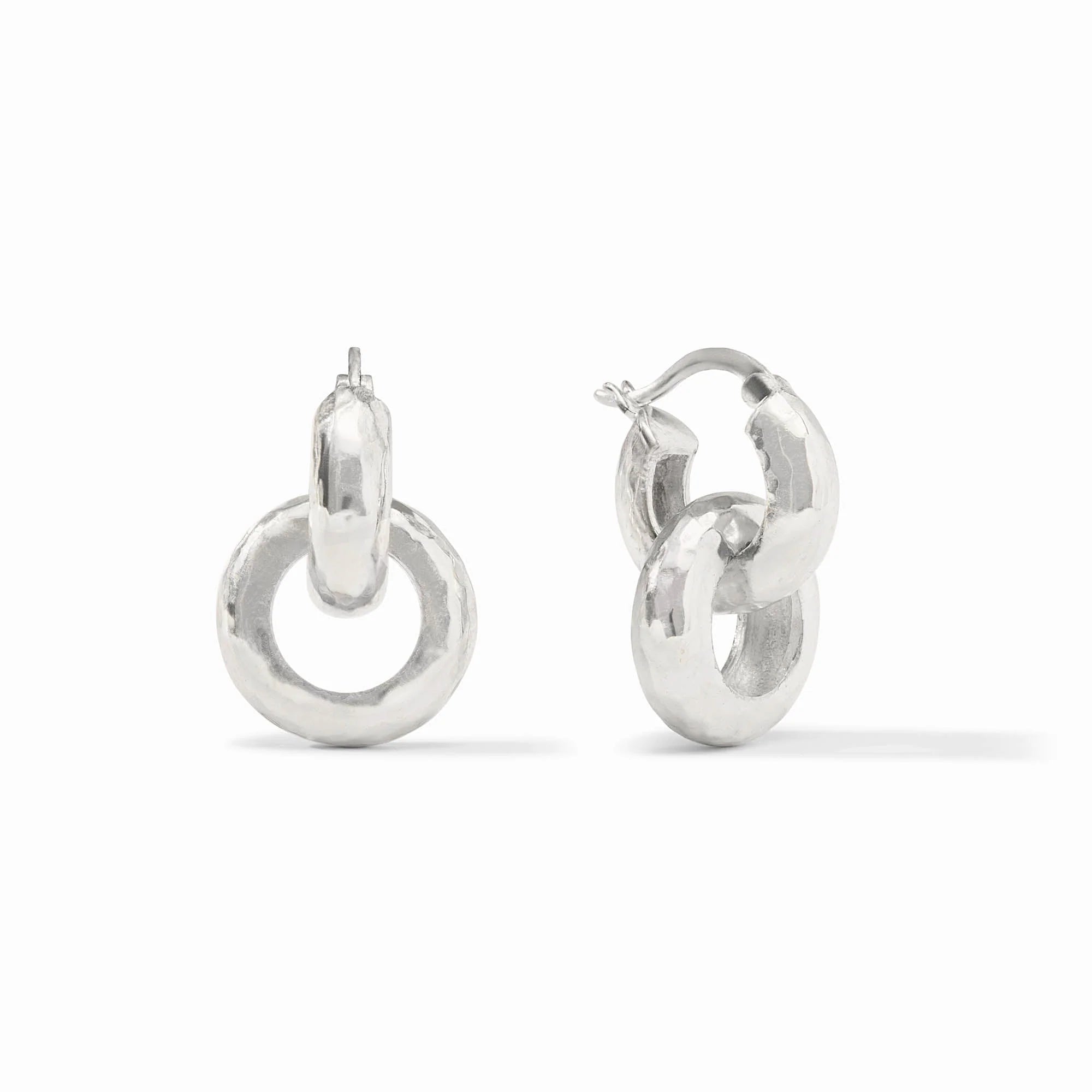 Pair of silver hoop earrings on a white background