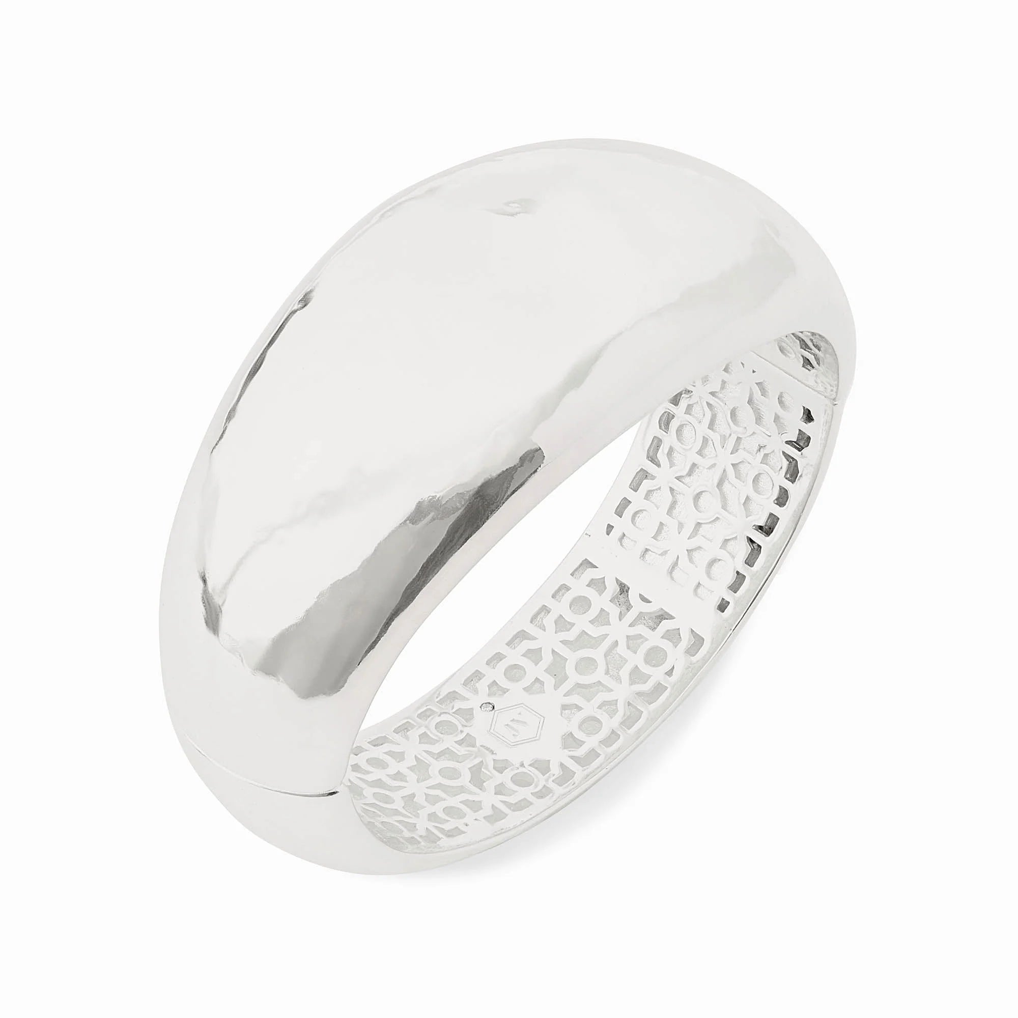 Silver ring with a textured design on a white background