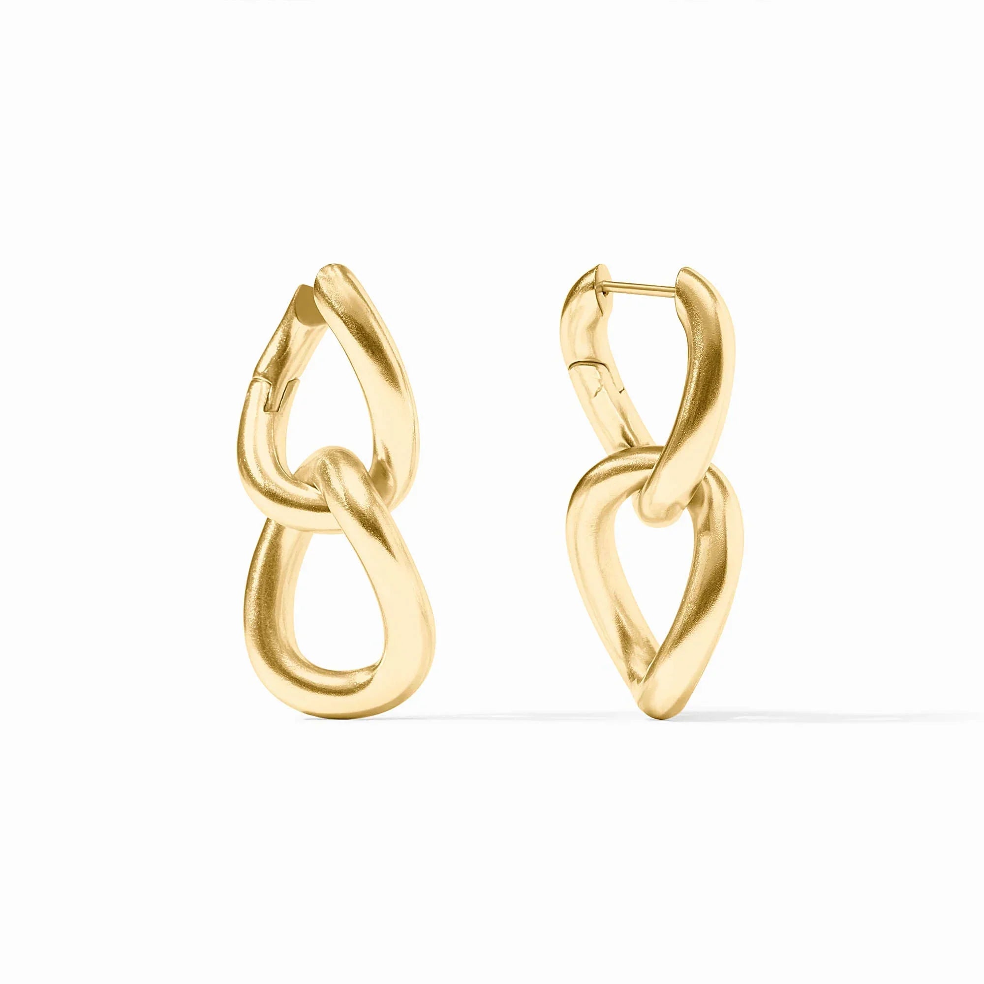 Gold hoop earrings on a white background