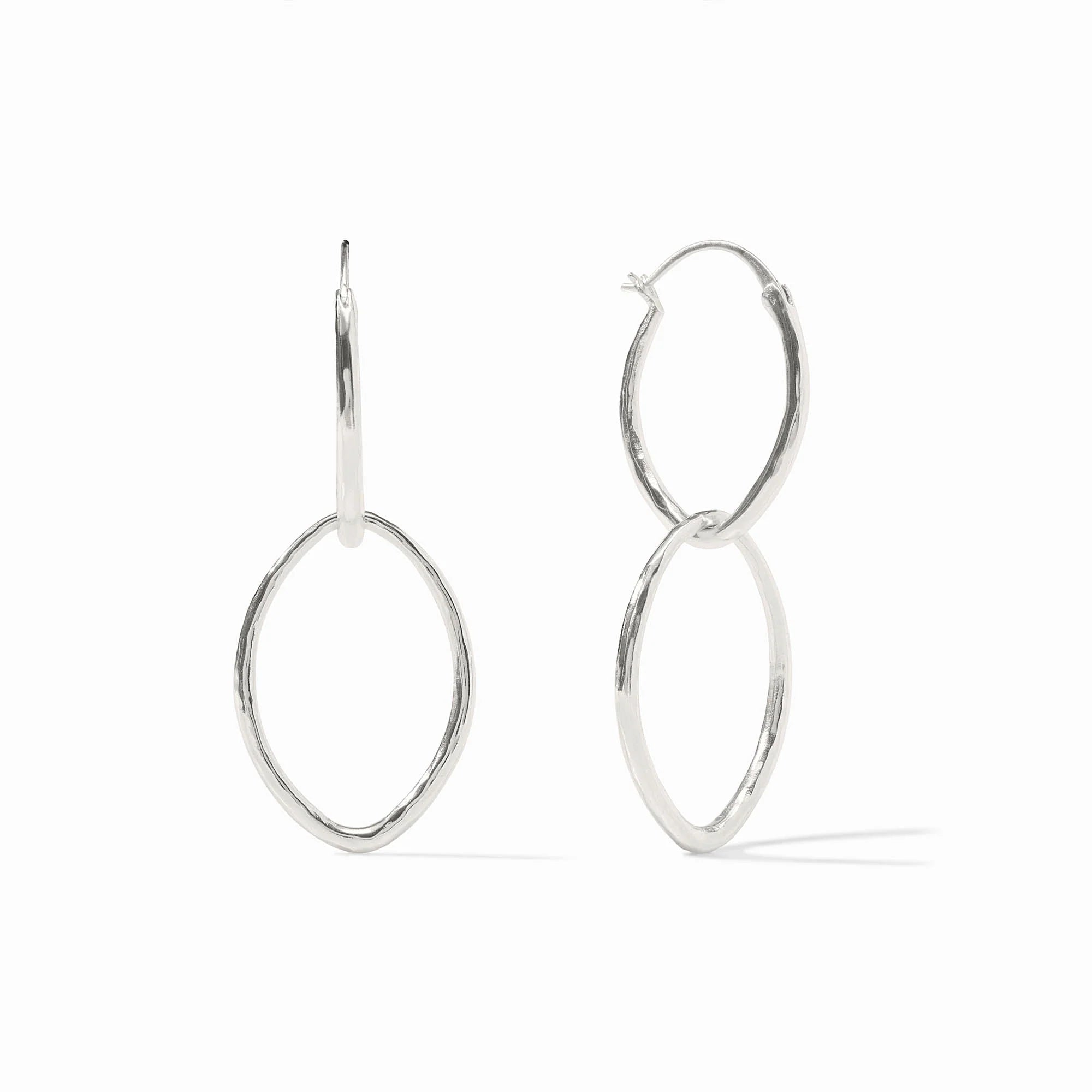 Silver hoop earrings on a white background