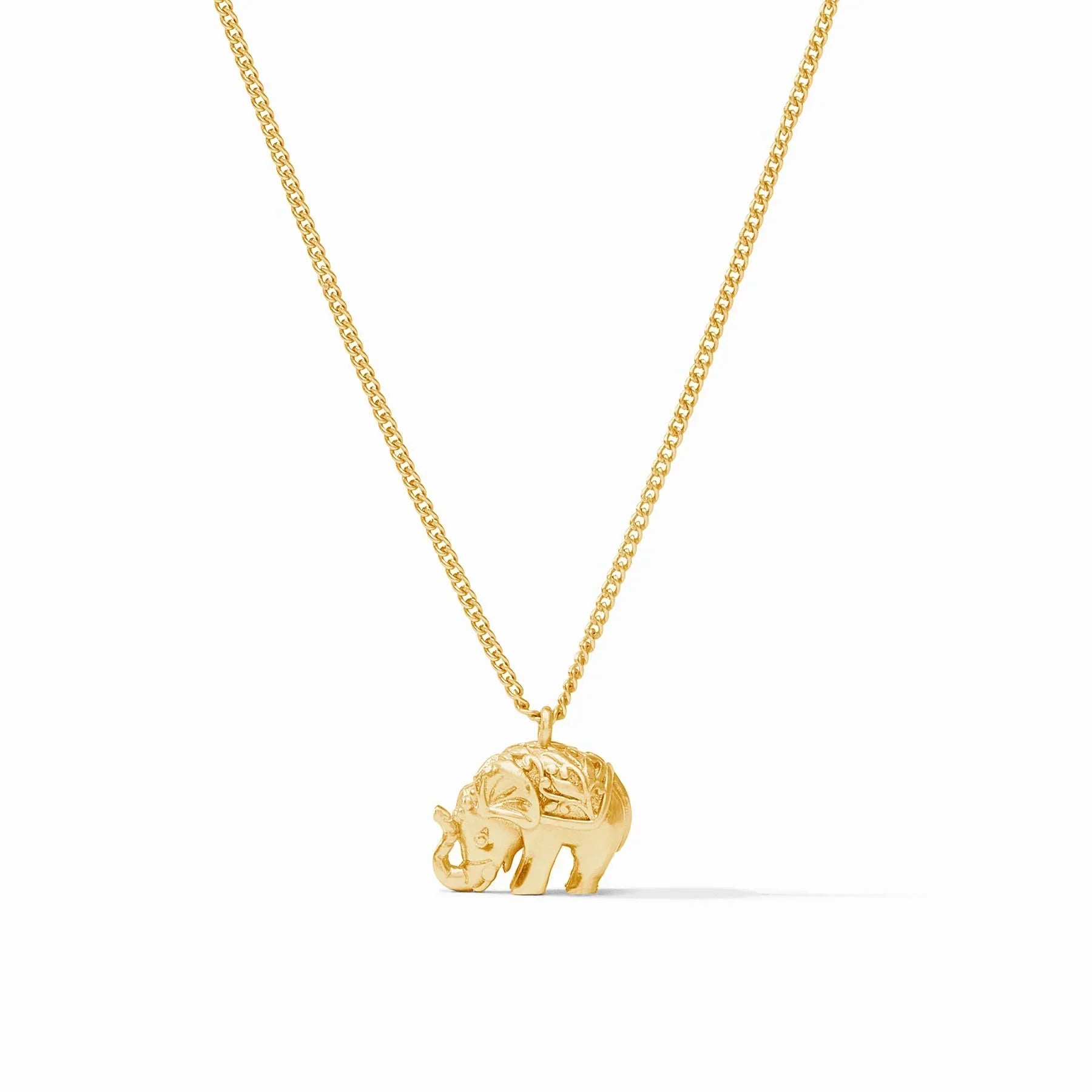 Gold elephant pendant necklace on a white background