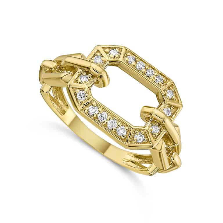 Gold ring with diamond accents on a white background