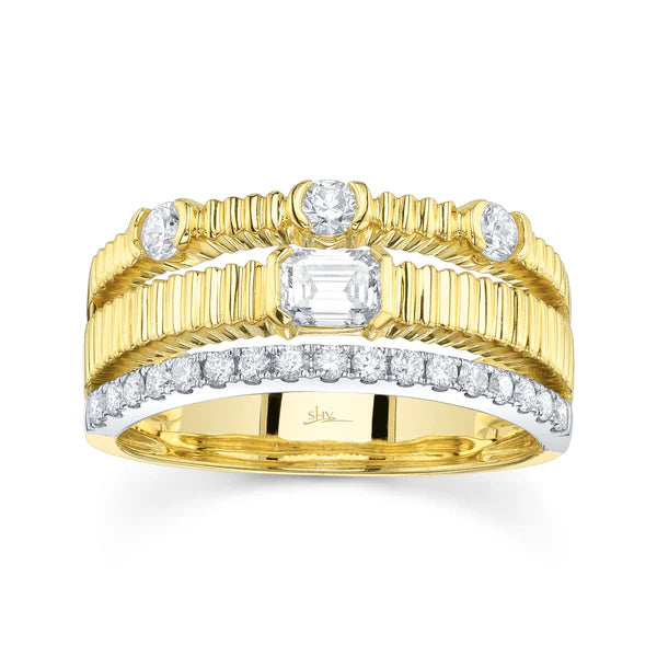 Gold ring with diamonds on a white background