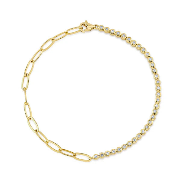Gold bracelet with diamond accents on a white background