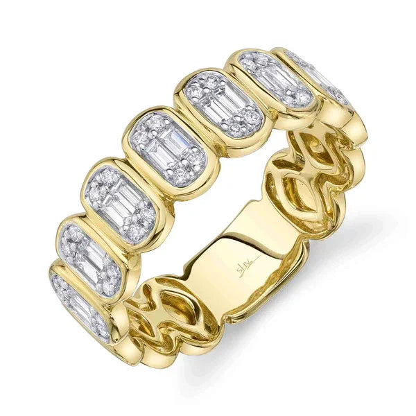 Gold ring with diamond accents on a white background