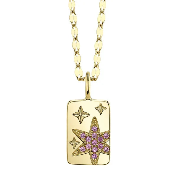 Gold necklace with star-shaped pendant on a white background