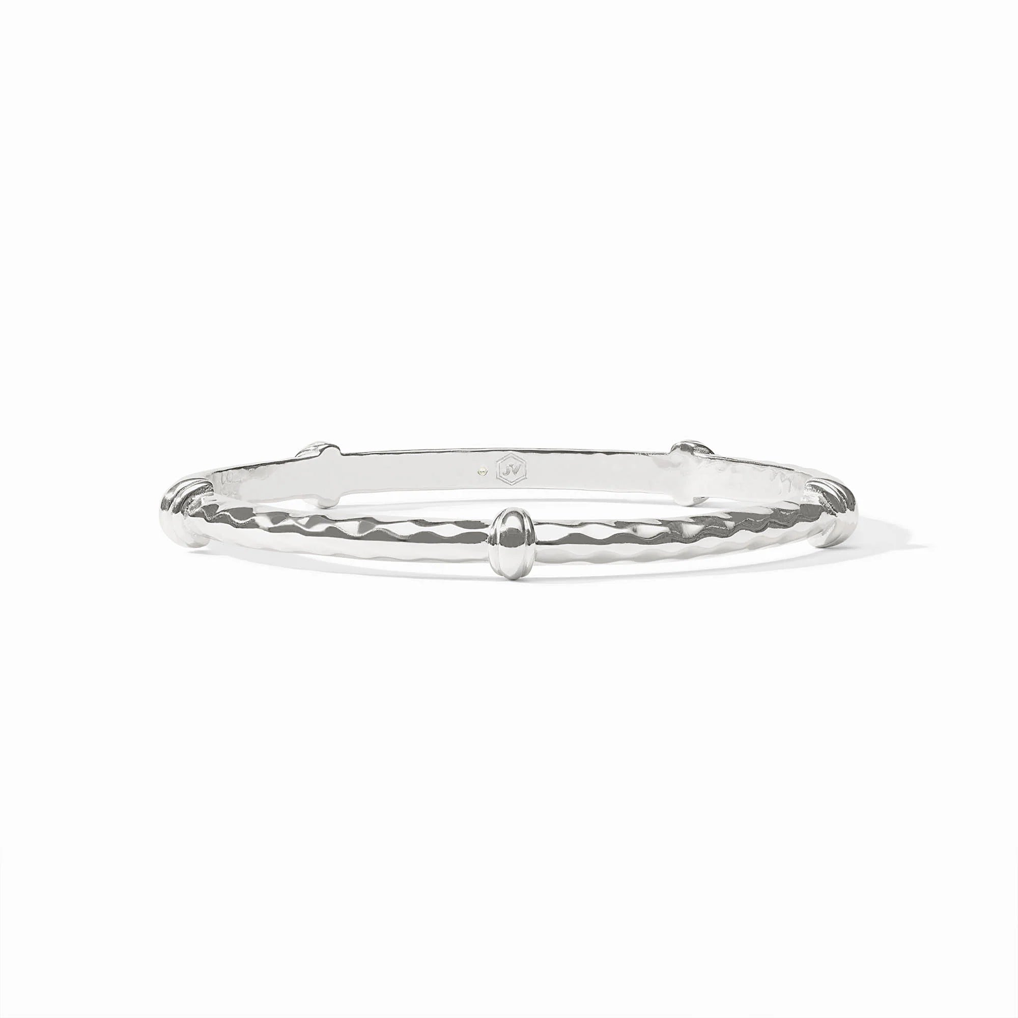 Silver bangle on a white background