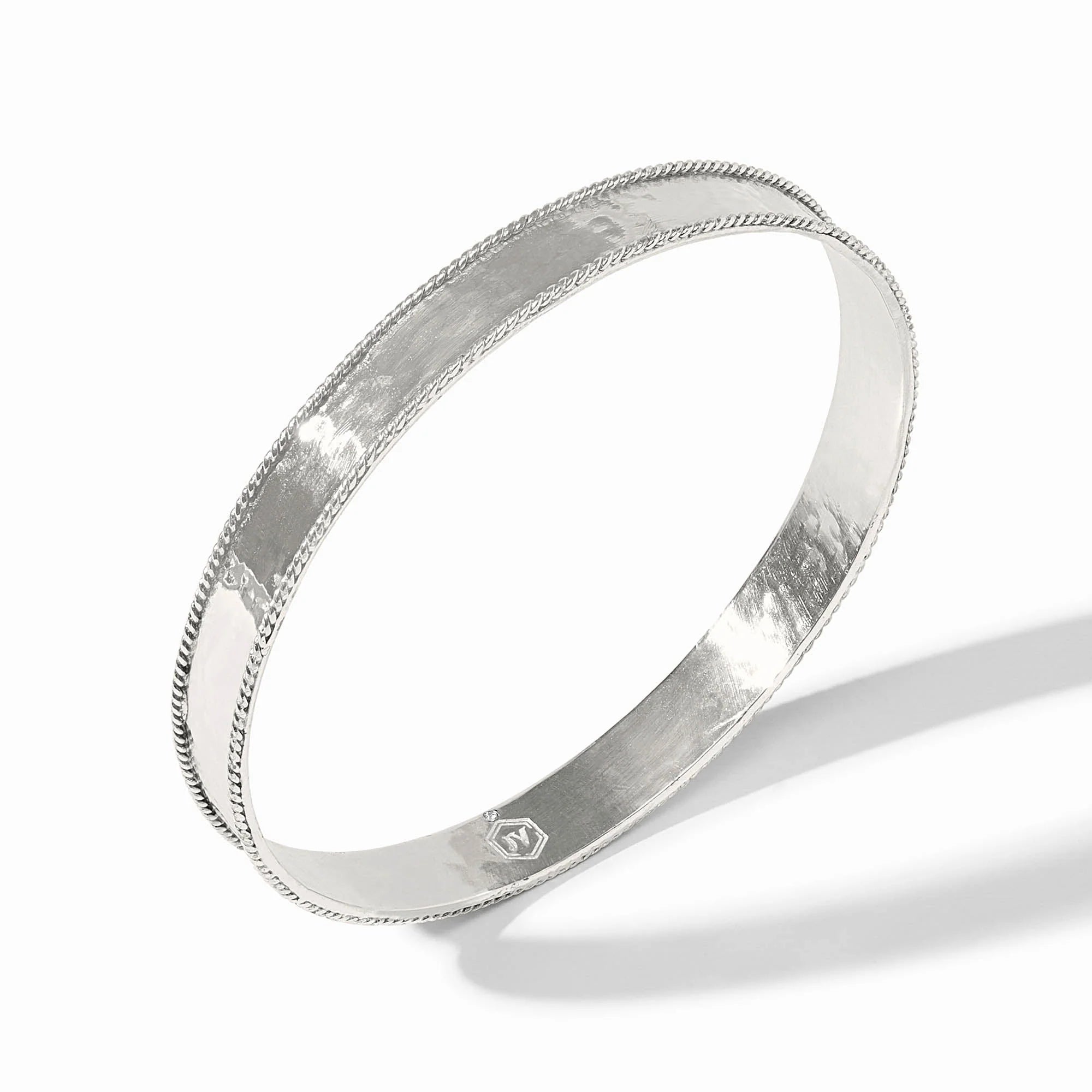 silver bangle on white background