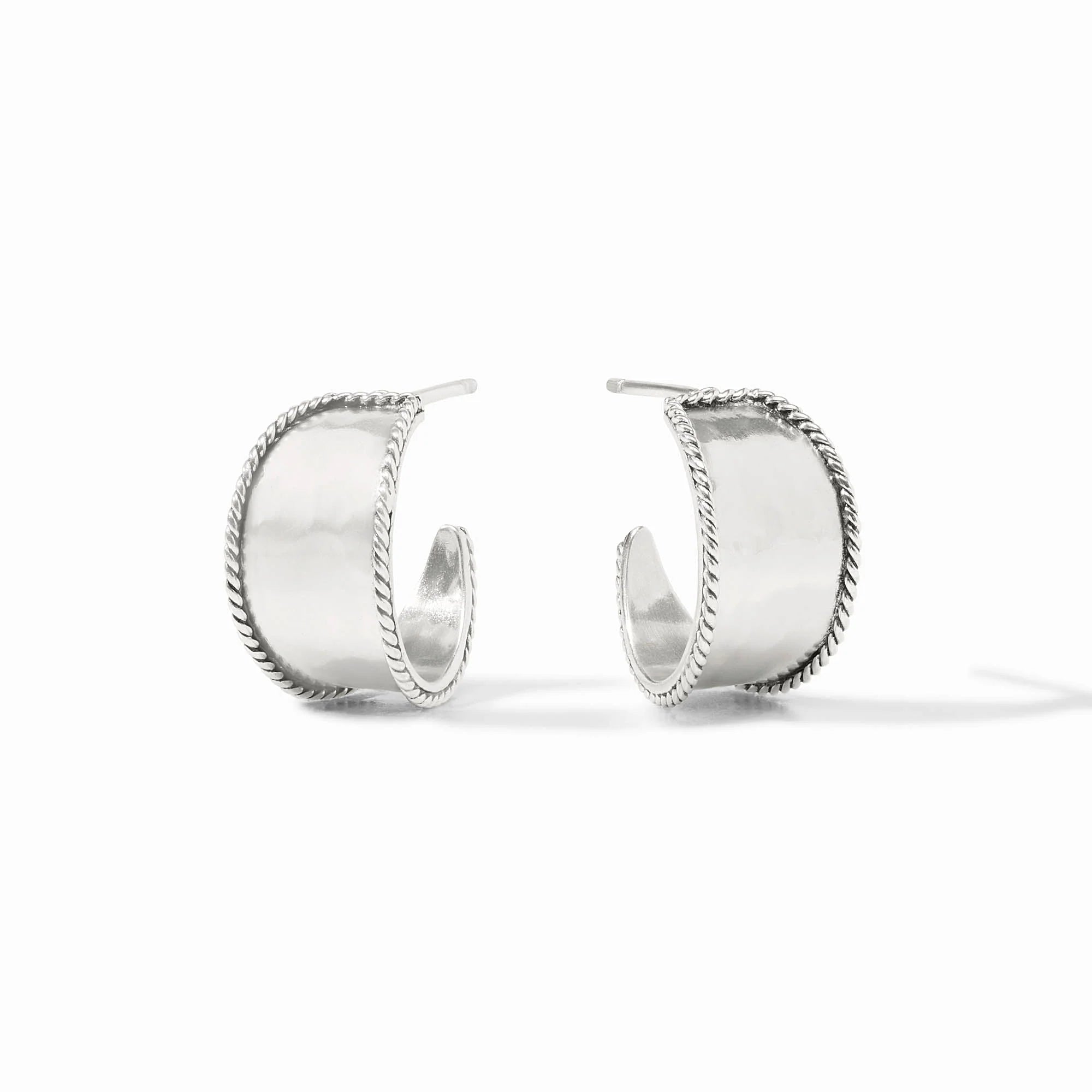Pair of silver hoop earrings on a white background