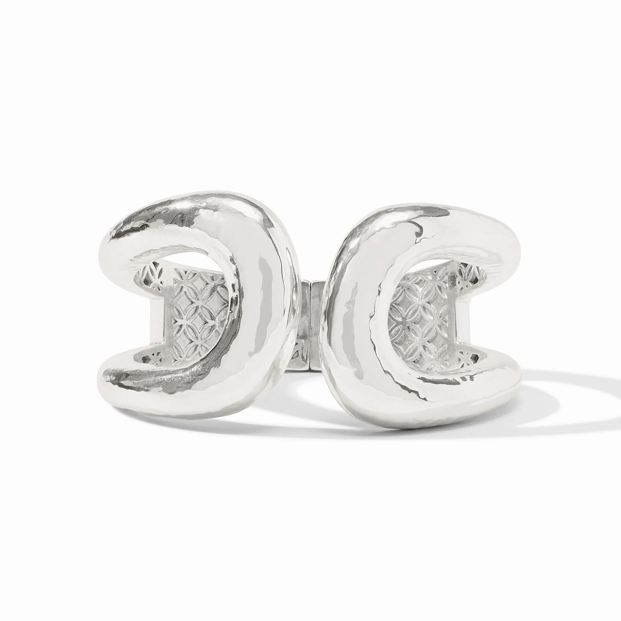 Pair of silver earrings on a white background