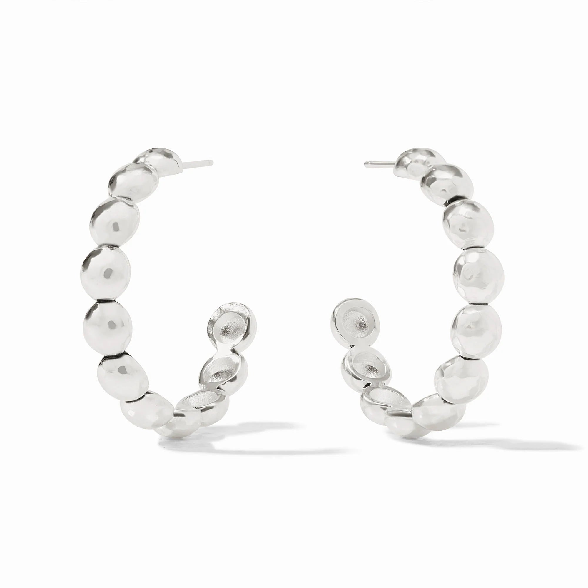 Silver hoop earrings with beaded design on a white background