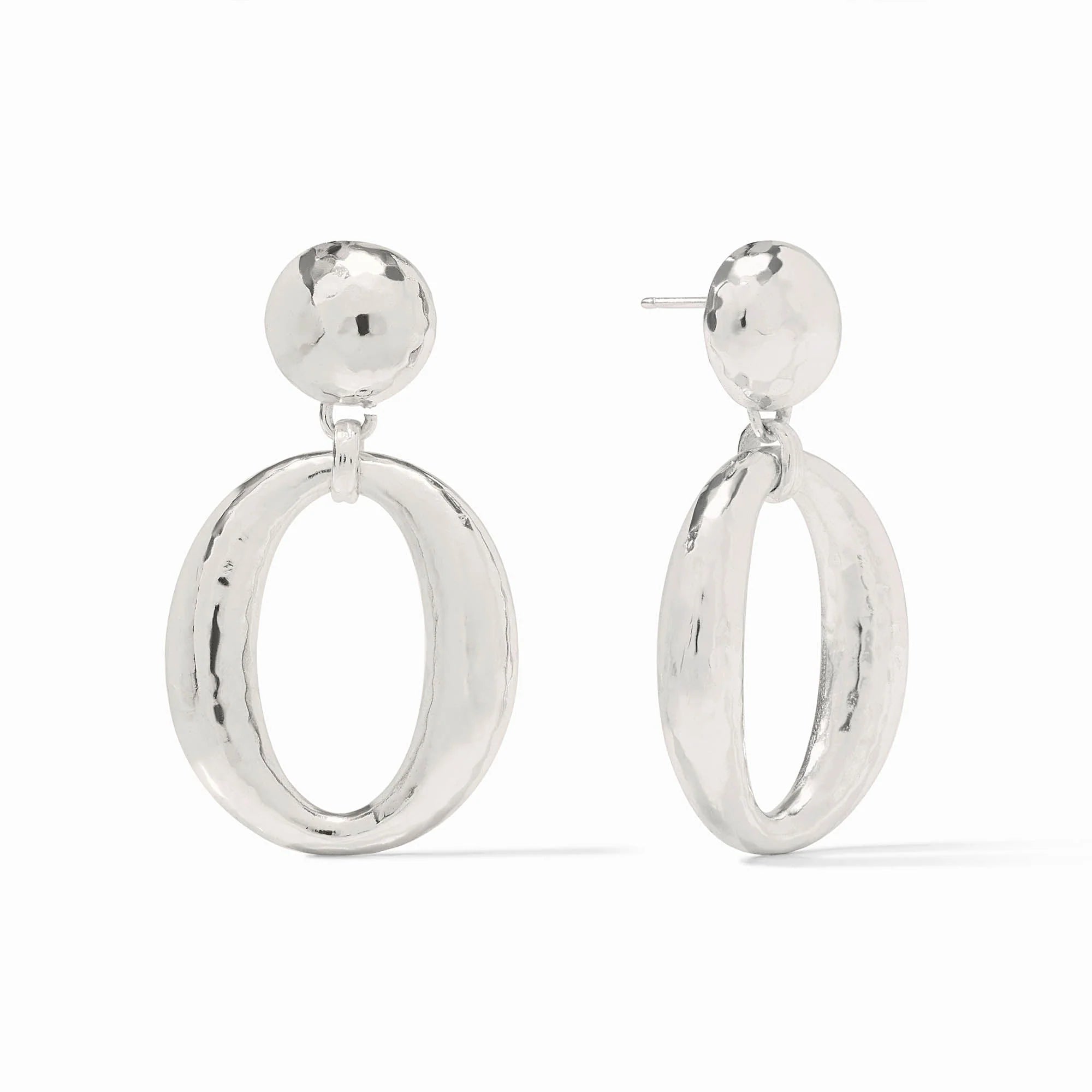 silver earrings on a withe background