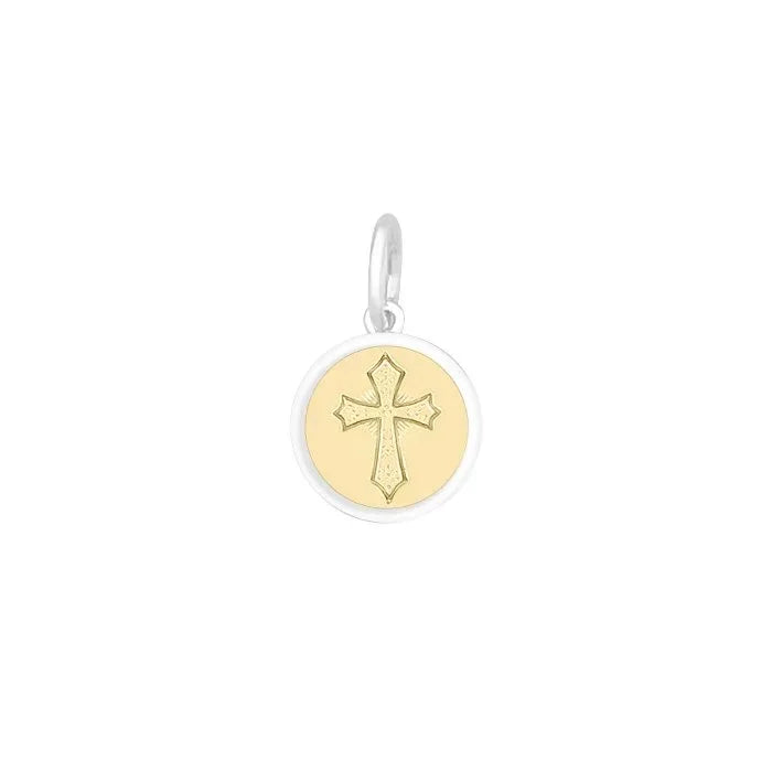 Gold and silver cross pendant on a white background