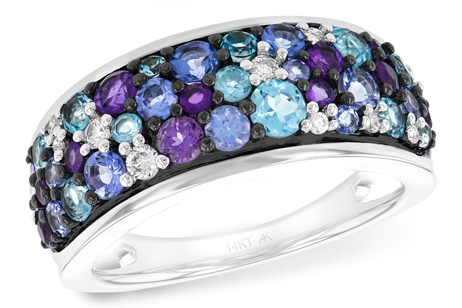 multi stone diamond band on a white background