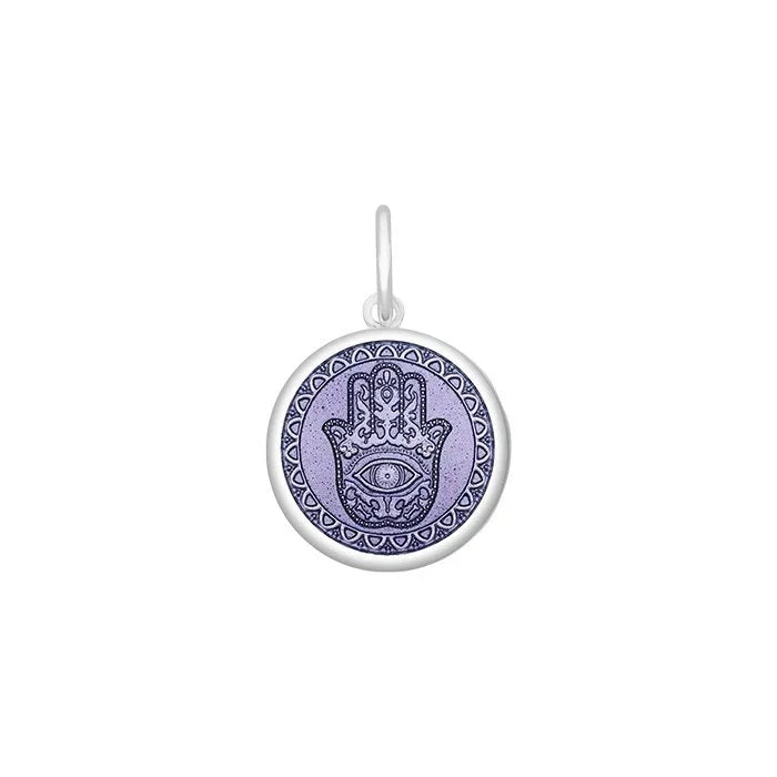 Silver pendant with Hamsa design on a white background