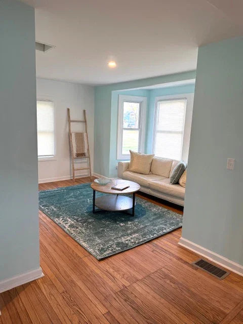 Bright coastal living room interior at Water Street Casa Madison Connecticut rental