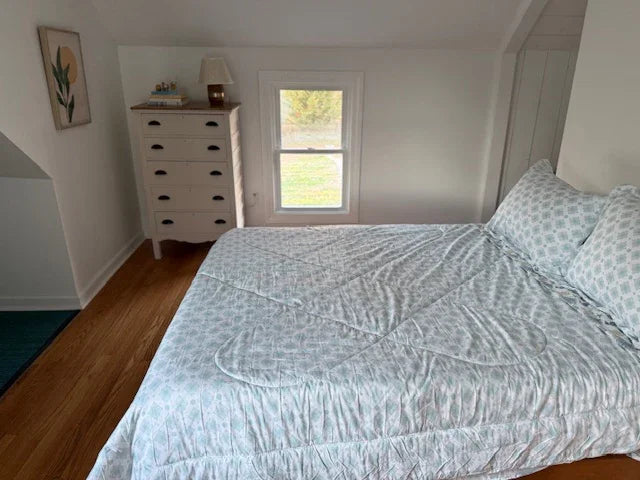 Serene bedroom at Water Street Casa Connecticut shoreline vacation home