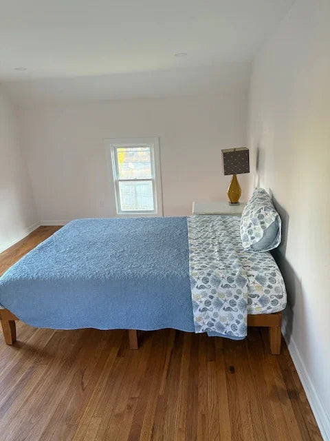 Serene bedroom at Water Street Casa Connecticut shoreline vacation home