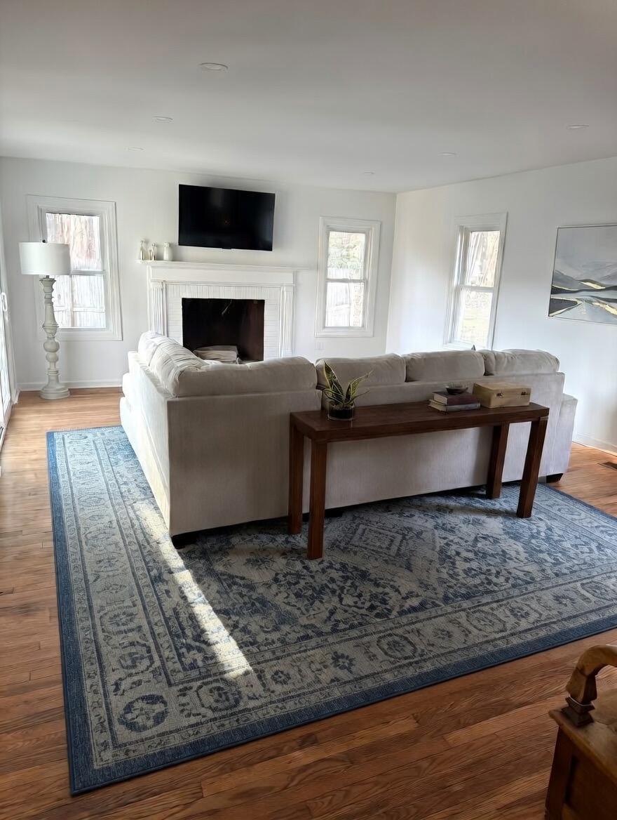 Bright coastal living room interior at Water Street Casa Madison Connecticut rental